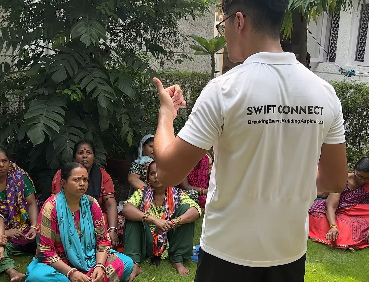 SWIFT Connect team member conducting training session with women entrepreneurs